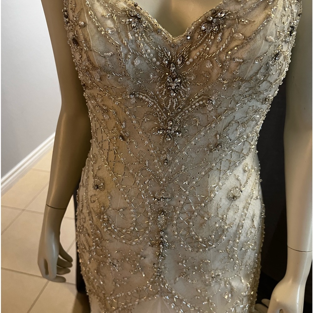 Beautiful new Christina Wu ivory wedding dress. Came from my bridal store.